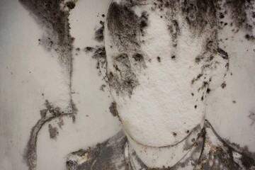 Anonymous face stone carving