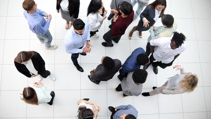 young multi ethnic business people group walking standing and top view