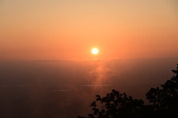 sunrise over the morning mist
