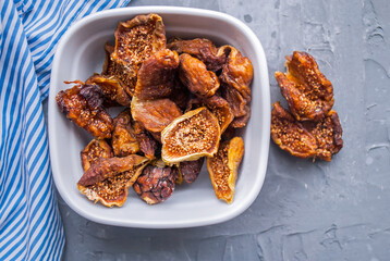Dried figs in a plate. Delicious dried fruit