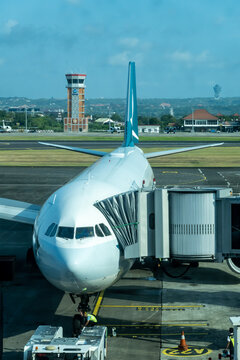 Denpasar, Bali, Indonesia A plane at the gate at the Denpasar Ngurah Rai airport.