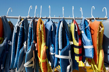 Buoyancy jackets on a rail, used when hiring a jet ski captiva island, Florida America united...