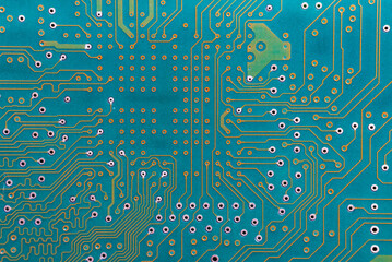 Motherboard, electronic circuit texture background. Hard disk macro photo