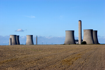 Fototapeta na wymiar Power Station cooling tower against blue sky