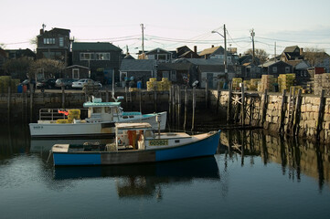 Fototapeta na wymiar Lobster boat at anchor in Rockport, Ma