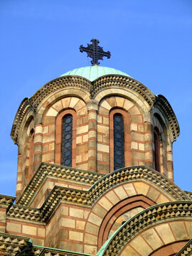Church dome with cross on the top from outside