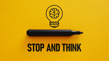 Fototapeta Stop and Think is shown using the text and picture of the lamp with brain obraz