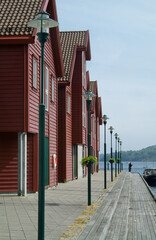 Traditional style, wooden shophouses on the quay in Farsund on the south coast of Norway