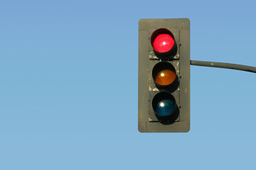 A traffic light gives the “Stop” signal.