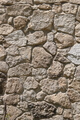 old wild stone wall without mortar	
