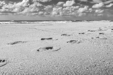 human footprints on the sea sand