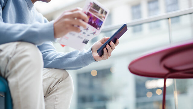 Businessman using Smart Phone with the email, call phone, address