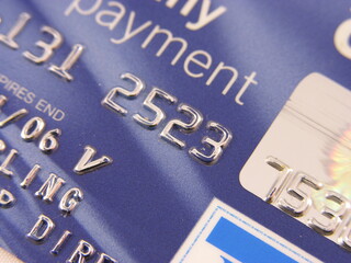 Ultra close up detail od a company payment card - obrazy, fototapety, plakaty