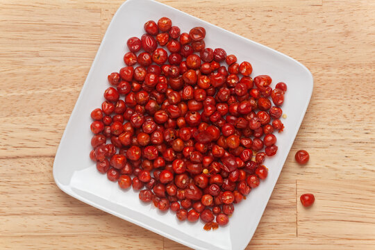 Small plate filled with Chile Tepin Peppers