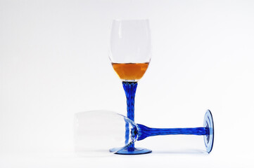Brandy in blue-stemmed wine flute.