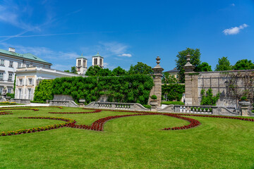 Beautiful Mirabell palace in Salzburg Austria with rose garden and statues