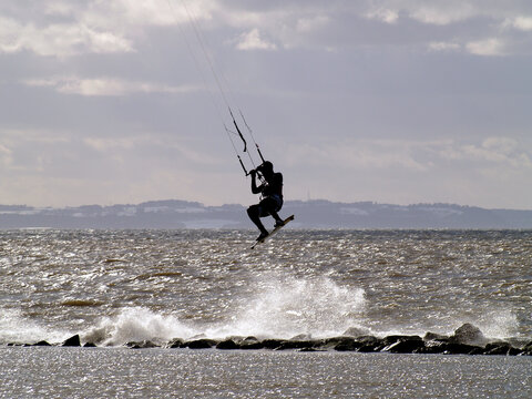 Kite surfing on Conwy Bay, Llandudno, North Wales in winter.