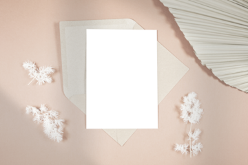 Wedding stationery suite cards styled with minimalist boho decor and on-trend shadow photography. 5x7 invitation, thank you, save the date card mockup.