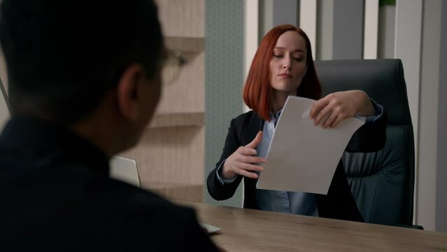 Caucasian businesswoman dissatisfied with cv application of African american man applicant refuse to client decline business documents fail job employment rejected offer in office negative decision no