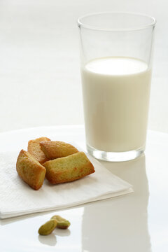 Glass with milk and some cookies