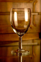 Perfume bottles over dark reflecting surface with space for text