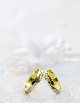 weddings rings on the white background