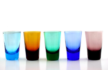 Close up of brightly colored drinking glasses