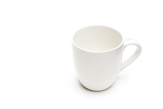 coffee cup - white cup, highkey closeup with limited depth of field, isolated on white. Ideal for Inserting your own text / logo