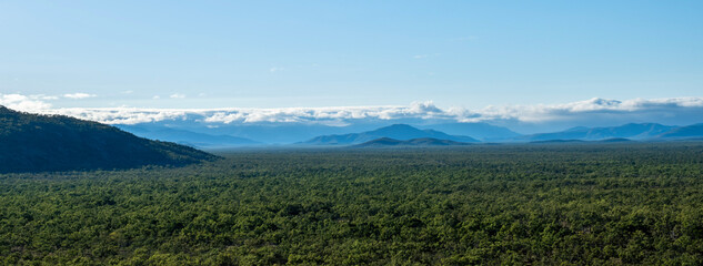 Panorama of the mountains on the road south from Cooktown, Queensland, Australia. There is low...