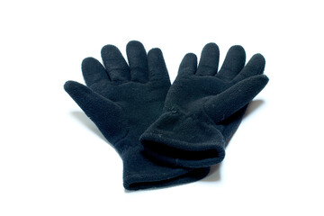 Woolen gloves against white background