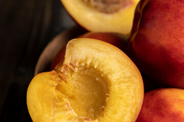 Nectarines folded in a wooden bowl