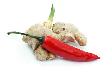 Red chili and ginger root on white background