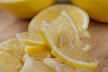 Yellow ripe lemon cut into slices