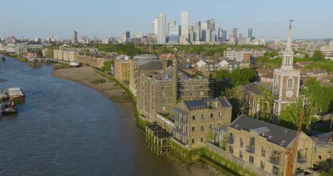 Aerial View Over River Thames And Canary Warf And Surrounding Architecture