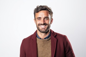 Obraz premium Portrait of a handsome man smiling at the camera over white background