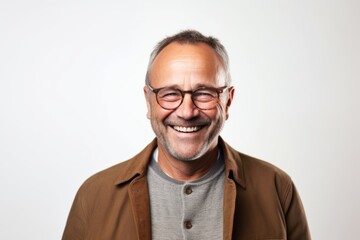 Portrait of a middle-aged man with glasses on white background
