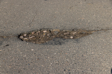 A damaged road dangerous for traffic