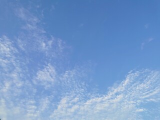 white clouds in the morning sky