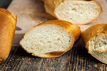 pieces of soft baguette on a cutting board