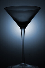 A low key image of a Martini glass.