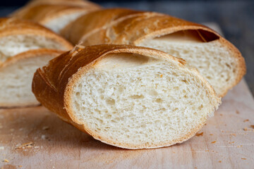 pieces of soft baguette on a cutting board