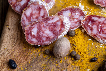 Dried veal sausage with white mold and spices
