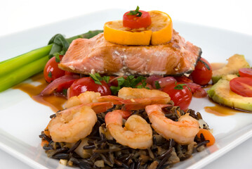 Salmon,asparagus, wild rice with shrimp, onion,roasted peppers and tomatoes with pomegranate sauce