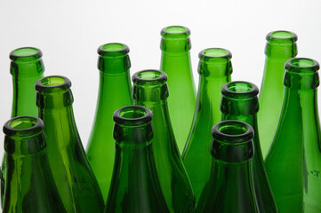 Green bottles over white background