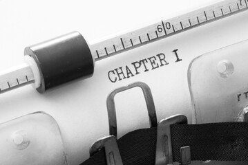 closeup of an typewriter with the words "CHAPTER 1"
