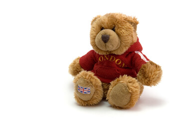 Teddy bear with british flag on the foot and with inscription "London" on the jacket