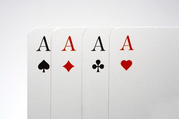 4 aces and a white background
