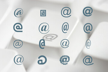 An @ sign and a keyboard as a symbol for email