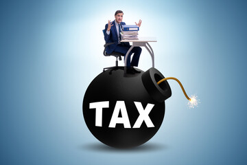 Tax concept with exploding bomb