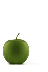 Isolated green apple with a bite taken from it located in bottom left hand corner with plenty of space to add text.